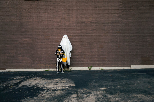 Father and Son Before Trick and Treat on Halloween