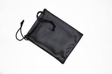Black case. Small black pouch. Small bag. Clutch with black laces. Pouch and laces.