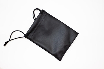 Black case. Small black pouch. Small bag. Clutch with black laces. Pouch and laces.