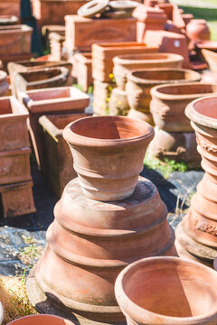 Large Terracotta Vases Stacked Outdoors