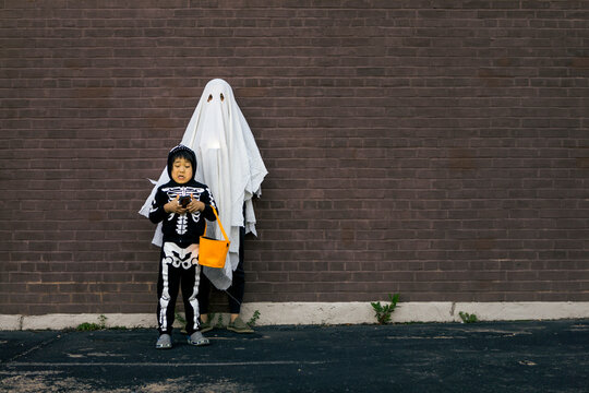 Father and Son Before Trick and Treat on Halloween