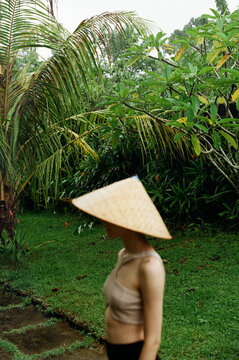 Woman wearing conical hat