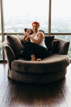 Woman relaxing in chair after long day of work