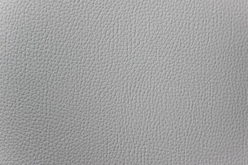Fototapeta na wymiar White armchair texture. Dermantine coating background. White dermantine texture. Leather chair texture. White leather armchair.