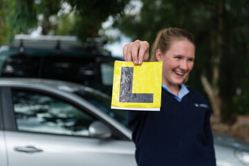 teen girl with Learner's plate