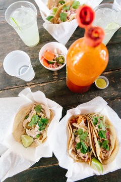 Tacos and hot sauce at a Mexican restaurant outside