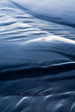 Close up of patterns in sand at low tide