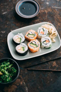 Food: Sushi rolls on a plate with ginger