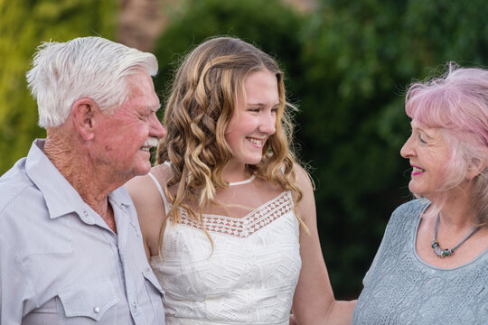 teen girl with her grandparents