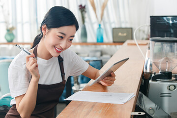 Coffee shop attendant with tablets
