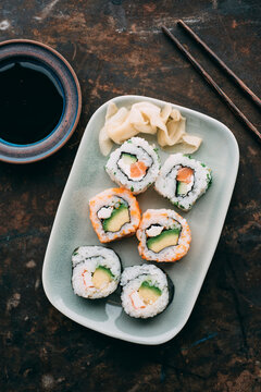 Food: Sushi rolls on a plate with ginger