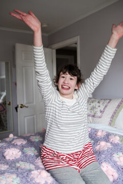 Happy autistic child in her bedroom