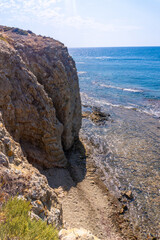 Fototapeta na wymiar Walls of the rocks of La Isleta del Moro in the natural park of Cabo de Gata, Nijar, Andalucia. Spain, Mediterranean Sea