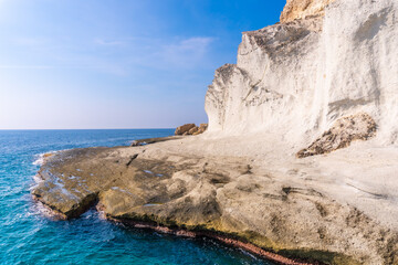 Fototapeta na wymiar The gigantic white rock walls at Cala de Enmedio in the Cabo de Gata natural park, Nijar, Andalucia. Spain, Mediterranean Sea