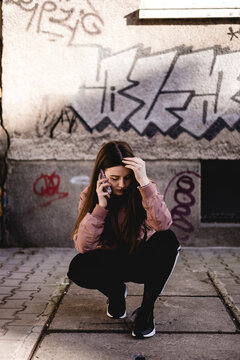 Young woman talking on the phone