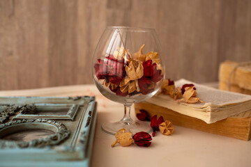 still life. glass and petals