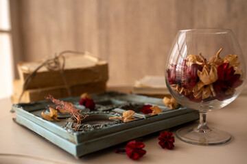 still life. glass and petals