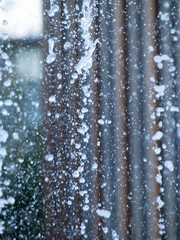Obraz na płótnie Canvas Water droplets from water fountain splashing on a nice background 