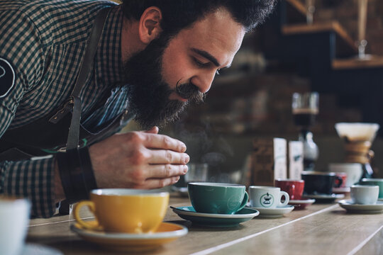 Barman Smelling Coffee