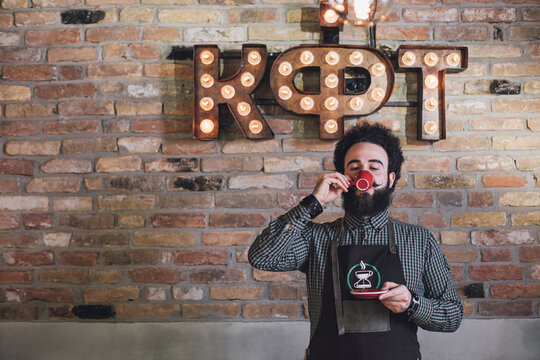 Barman Drinking Coffee