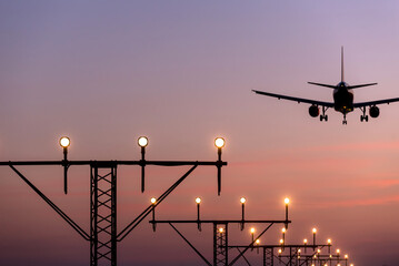 Guiding light burning and airplane landing