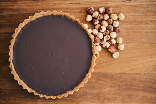Chocolate cake and hazelnuts, top view