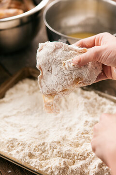 Fried: Man Finished Breading Chicken Thigh