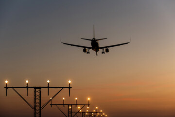 Guiding light burning and airplane landing