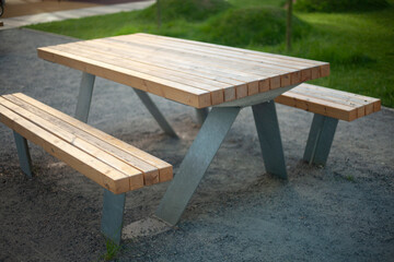 The table is outside. A table in the park
