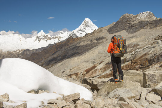 Mountaineer admiring the view of Coridllera Blanca mountain rang