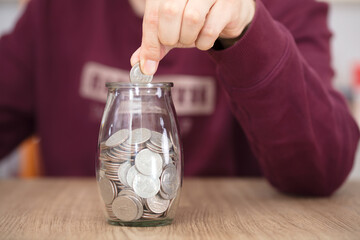 Put a coin in a glass bottle