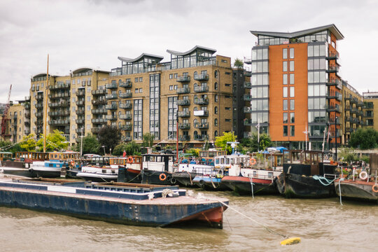 Barges on Thames River London, England