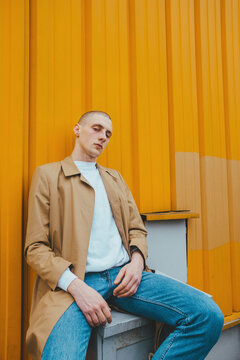 Portrait of young hip adoslecent guy /skinhead/punk subculture.