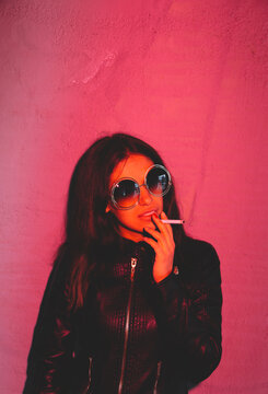 young latin american woman smoking