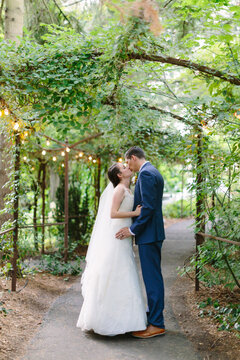 Bride and Groom Kissing at Outdoor Wedding in Oregon
