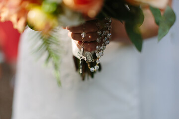 Bride Holding Bouquet with Rosary