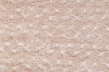 Horizontal knitted background with a recurring homogeneous pattern. 