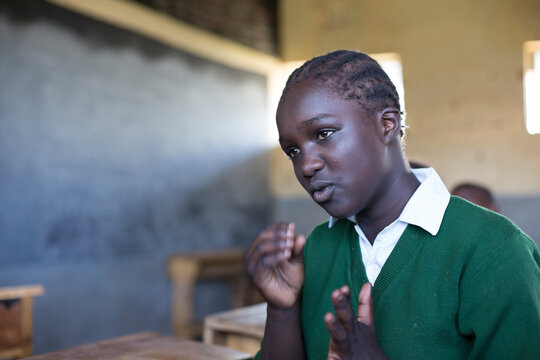 Deaf school children learning sign language