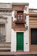 Fototapeta na wymiar Casa Minima, located in the iconic neighborhood of San Telmo in Buenos Aires, is the narrowest house in the city.