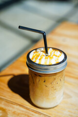 iced coffee caramel macchiato in cafe