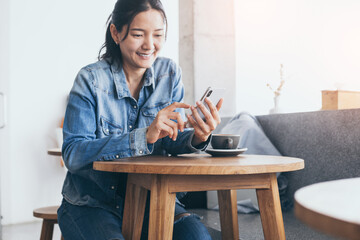using cell phone.hand holding texting message on screen mobile chatting,search internet information...