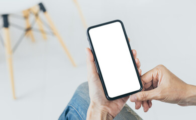 cell phone mockup blank white screen.woman hand holding texting using mobile on desk at coffee shop.background empty space for advertise.work people contact marketing business,technology