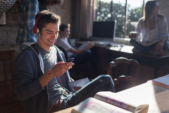Casual Smile Man Listen Music with Phone