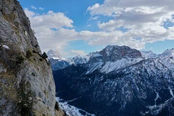 Fototapeta na wymiar aerial snow covered mountain peaks in alps at winter 