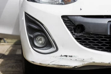 Deurstickers crashed car Front bumper cover with cracks.. © kasarp
