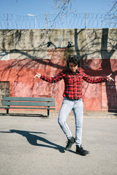 Young woman during krump break dance in Williamsburg, Brooklyn