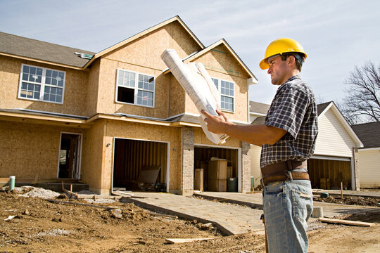 Construction: Builder Refers To Plans Near New Home