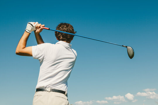 Golfer Playing off the Tee Box