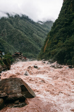 River with raging waters in Aguas Calientes, Peru