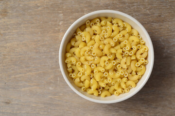 Macro photo food product raw eibow macaroni Vermicelli